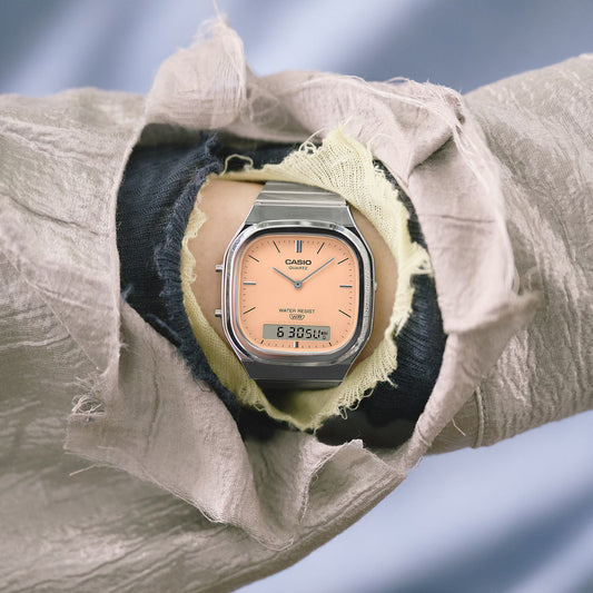CASIO VINTAGE SILVER STAINLESS STEEL ORANGE DIAL UNISEX WATCH AQ-240E-4A