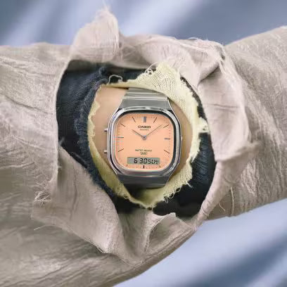 CASIO VINTAGE SILVER STAINLESS STEEL ORANGE DIAL UNISEX WATCH AQ-240E-4A