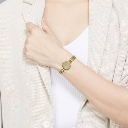 Titan Raga Showstopper Quartz Analog Silver Dial Golden Metal Strap Watch For Women nu95349ym01