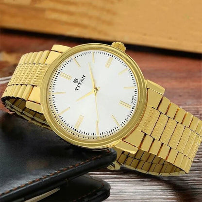 Titan Quartz Analog Silver Dial Golden Stainless Steel Strap Watch For Men np1712ym01