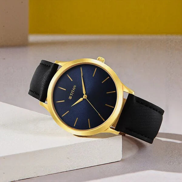 Titan Karishma Radiance Blue Dial Analog Leather Strap watch for Men nt1825yl05