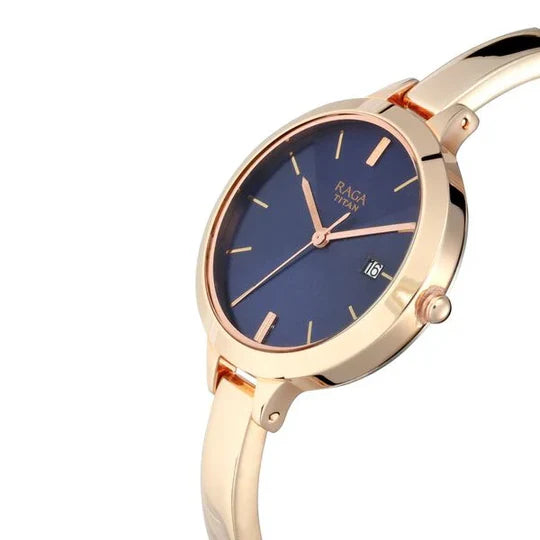 Titan Raga Blue Dial Metal Strap Women'S Watch Nn2578Wm02