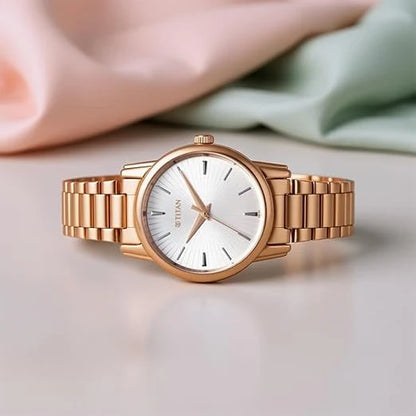 Titan Karishma Quartz Analog Silver Dial Rose Gold Stainless Steel Strap Watch For Women nu2760wm01