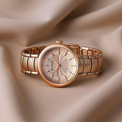 Titan Aura Quartz Analog Rose Gold Dial Rose Gold Stainless Steel Strap Watch for Women-NT95240WM01