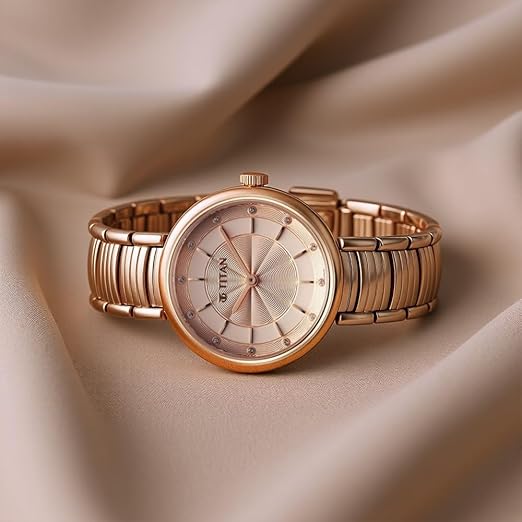 Titan Aura Quartz Analog Rose Gold Dial Rose Gold Stainless Steel Strap Watch for Women-NT95240WM01