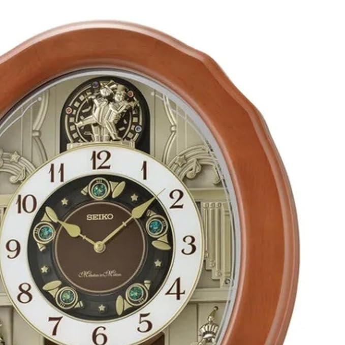 SEIKO Elegant Brown Oval Wooden Hourly Chime 30 Melody in Motion Home Decor Wall Clock with One Way Rotating Pendulum - QXM604BT