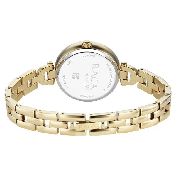 Titan Raga Showstopper Quartz Analog Green Dial Golden Metal Strap Watch For Women nu95345ym01
