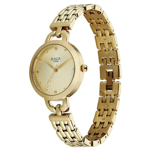 Titan Raga Showstopper Quartz Analog Silver Dial Golden Metal Strap Watch For Women nu95349ym01